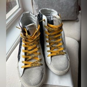 Golden goose gray denim slides. Fun Yellow laces. Worn 2x .  Dust bag, box.